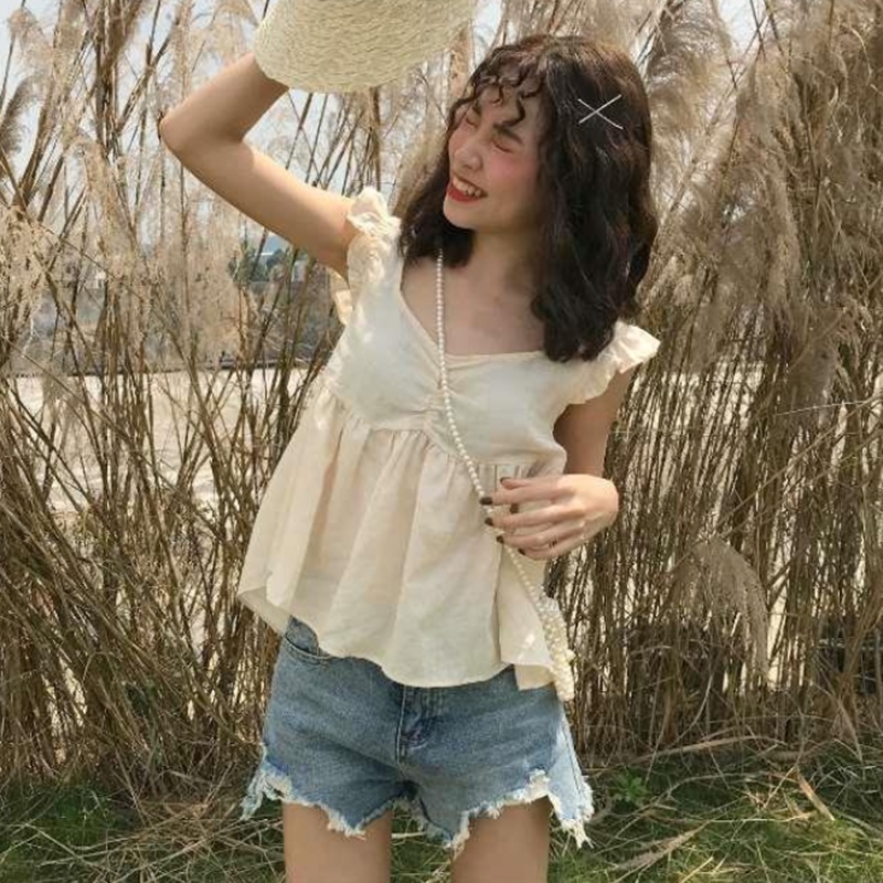 Áo hai dây IELGY dáng rộng màu xanh lá / mơ hở lưng phong cách Hàn Quốc cho nữ