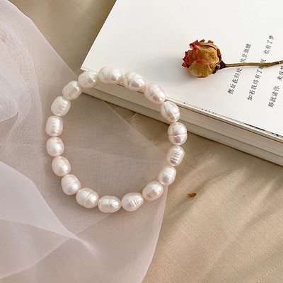 Vòng Tay Ngọc Trai 8ly Chỉ Thun Co Giãn Kiểu Dáng Tinh Tế - Ngọc Trai Trường Thịnh