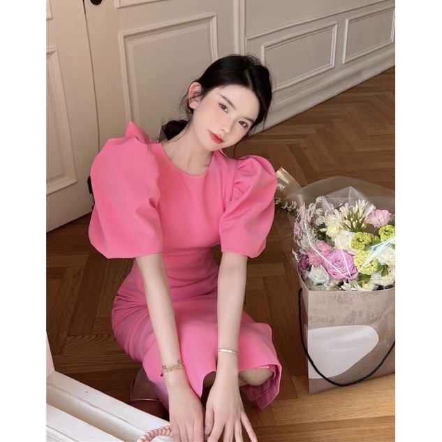 Đầm đuôi cá màu hồng baby hở lưng dáng dài phối nơ sang chảnh