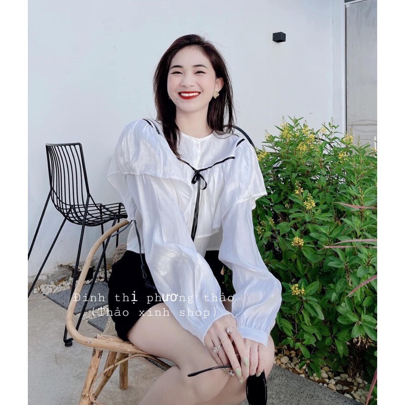 Áo croptop satin trắng viền bèo tay dài phồng thắt nơ đen