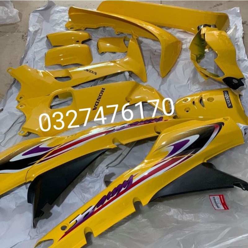 Bộ nhựa dàn áo xe WAVE Alpha đời đầu màu vàng zin honda