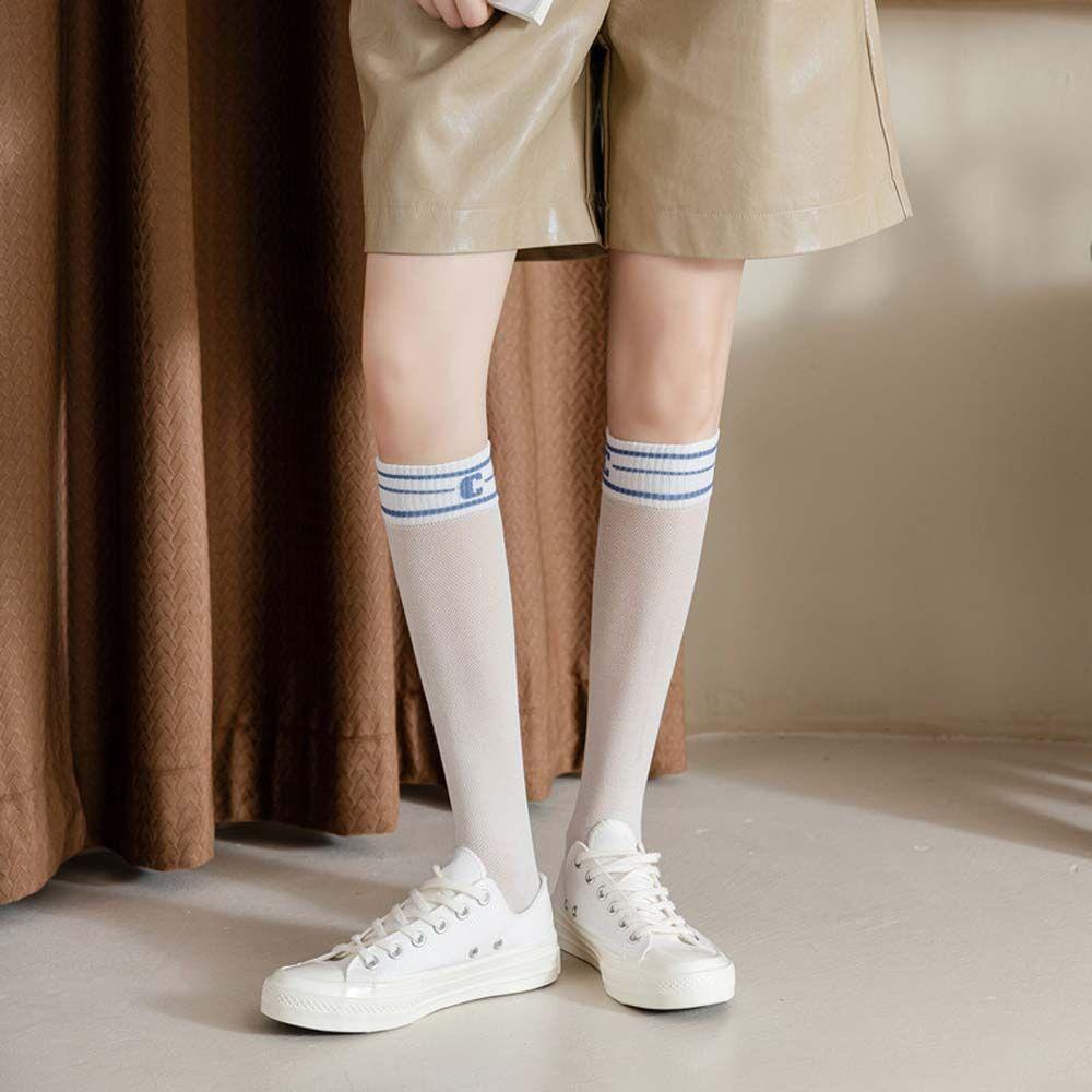 Đôi Tất Lưới Kẻ Sọc Chữ C Xinh Xắn Cho Nữ