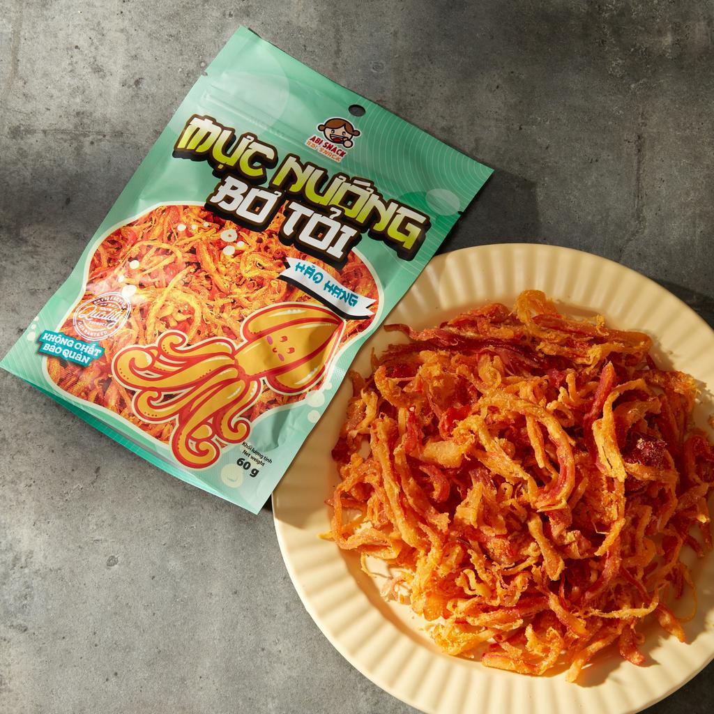 NEW MỰC NƯỚNG BƠ TỎI ABI SNACK FOOD GÓI 60g