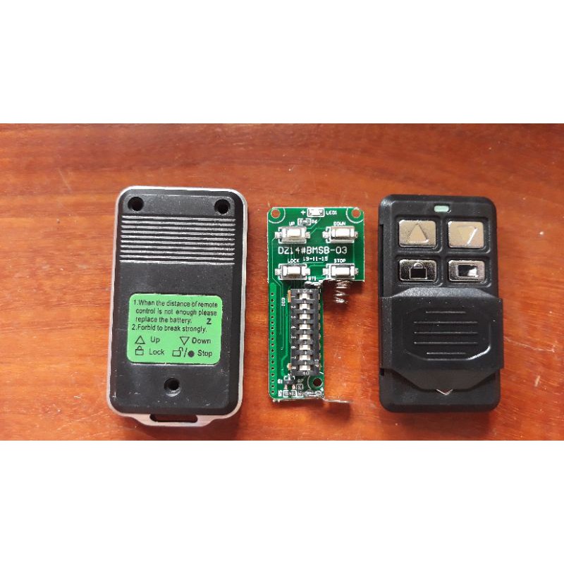 Điều khiển cửa cuốn mã gạt 315 mhz JG Taiwan