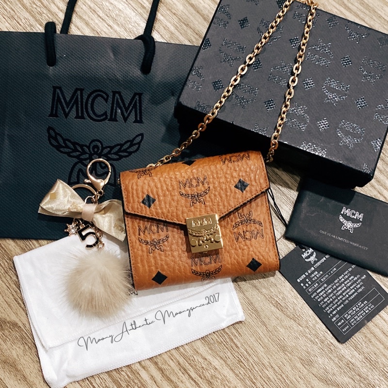 Charm Bông mix nơ hãng MCM auth