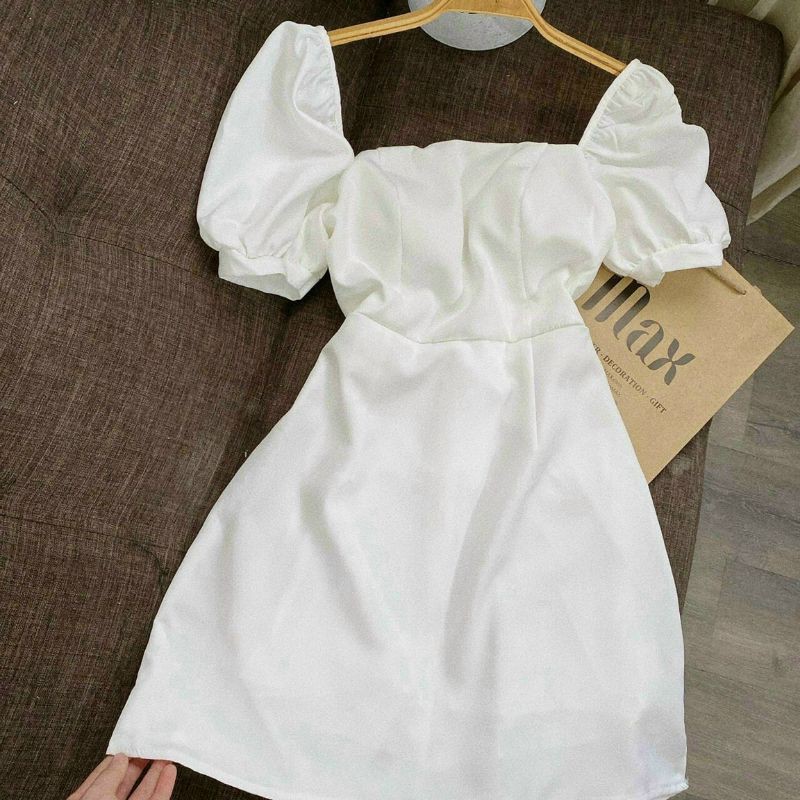 váy trắng xòe nút bọc hông