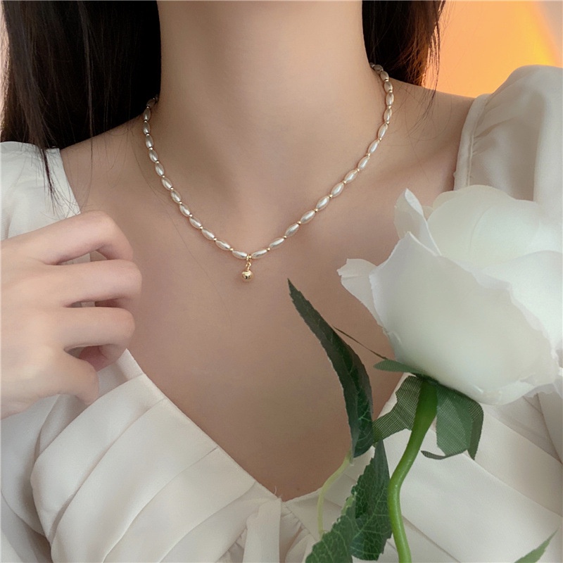 Dây chuyền mặt tròn ngọc trai nhân tạo hạt dài sang trọng