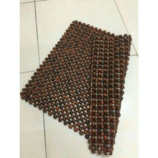 Đệm lót ghế bằng hạt gỗ thoáng mát