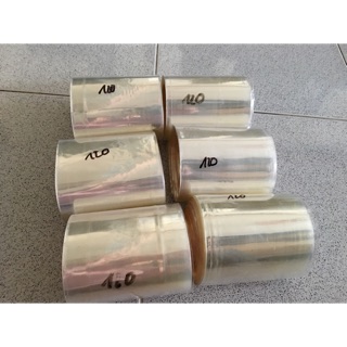 Màng co pvc loại 1 không pha phế, màng sấy nhiệt , máy khò màng co nilong pvc bọc hộp