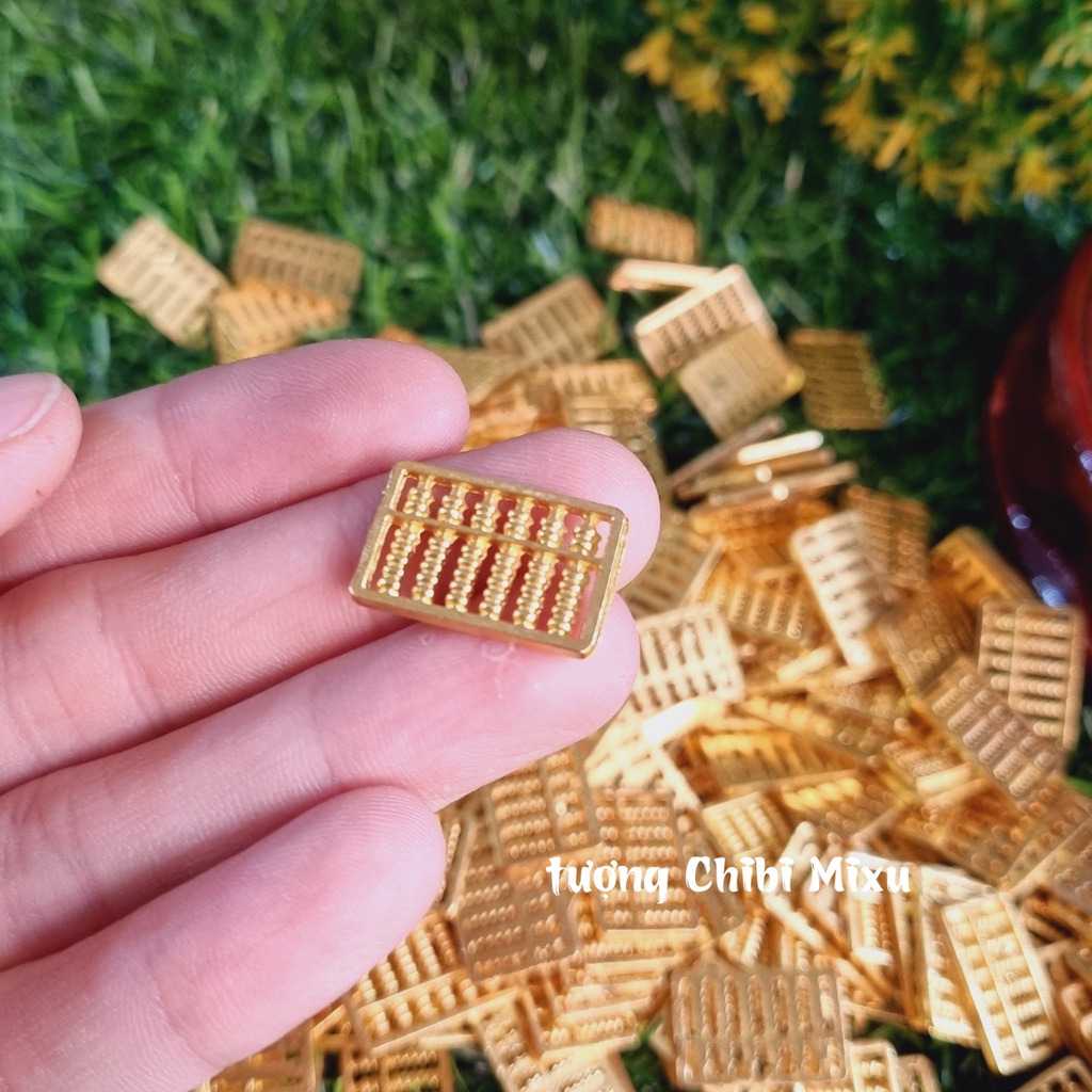 01 bàn tính Thần Tài kim loại size 20x13x1,1mm / 41x23x1.5mm