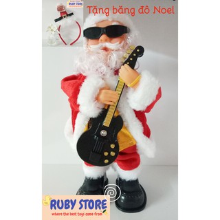 ÔNG GIÀ NOEL CẦM ĐÀN GUITAR, ĐEO KÍNH ĐEN, NHÚN LÊN XUỐNG, NHẠC GIÁNG SINH