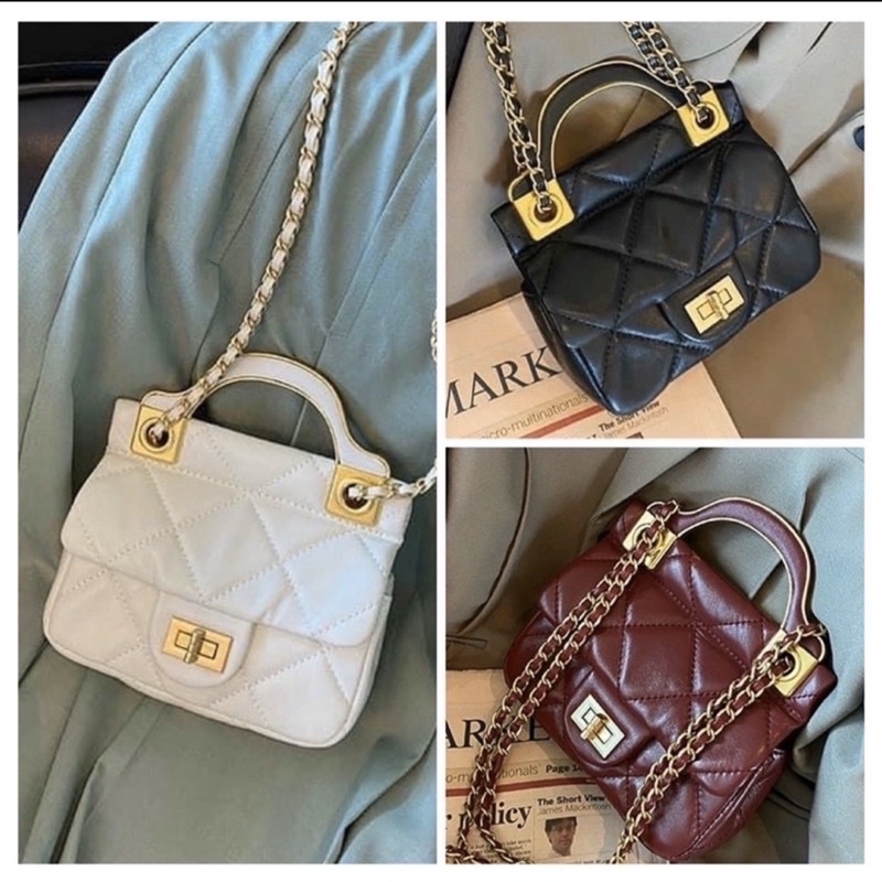 Túi Vân Ô trám khoá xoay có quai cầm chất da mềm zize 15 chuẩn đẹp