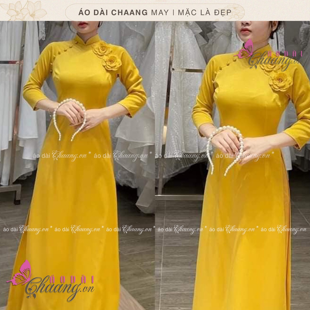 Áo dài thiết kế_Chaang_May sẵn áo dài đẹp khuy bọc 2 bồng hoa vàng, vải lụa cao cấp