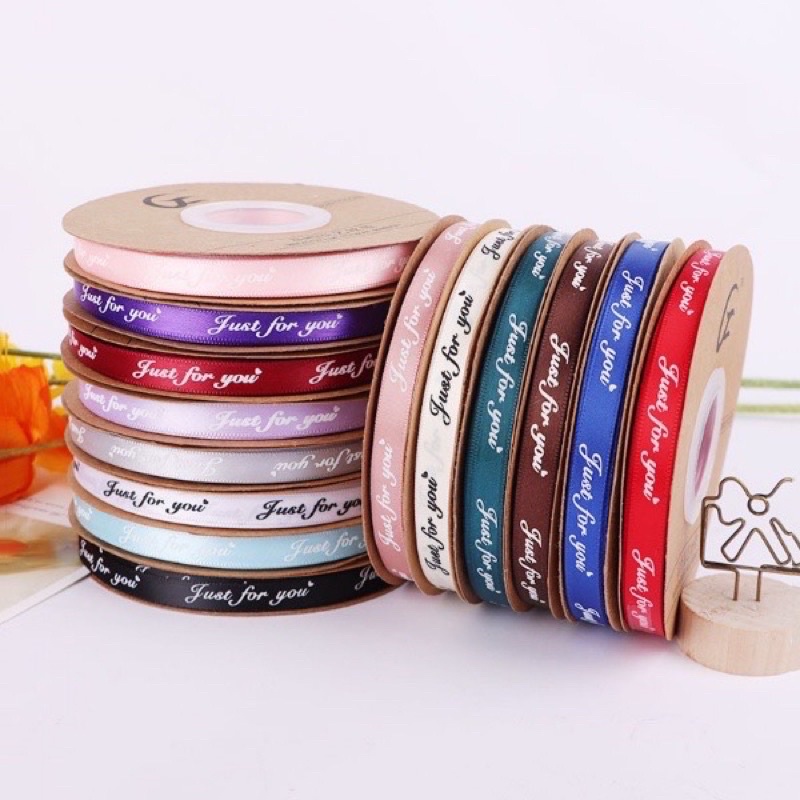 Sỉ cuộn duy băng lụa in chữ rộng 1cm dài 50m ,100m sang chảnh