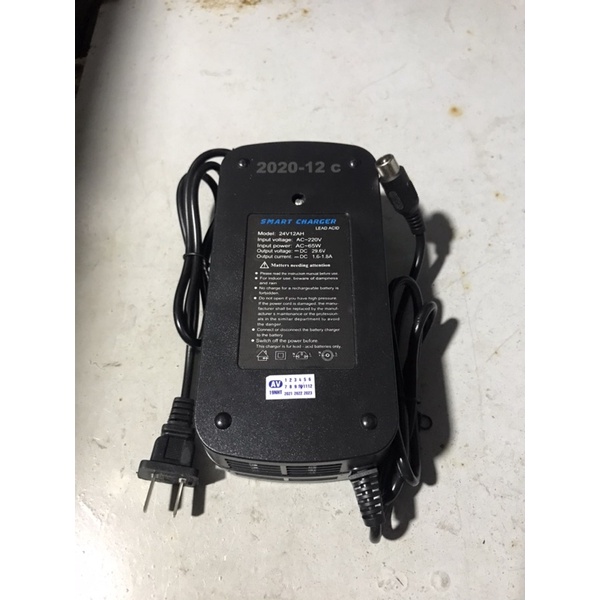 Sạc xe đạp điện, sạc xe máy điện 24V12Ah, 36V12Ah chân tròn có kim có đèn báo tự ngắt khi sạc đầy