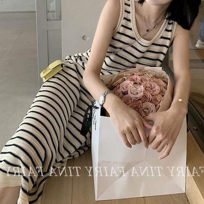 Váy kẻ len montoghi mỏng phối lưới dài sang