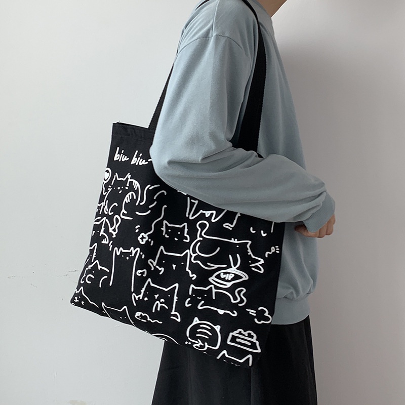Túi tote vải canvas đeo vai họa tiết mèo dễ thương khóa kéo túi phụ 2 màu đen be mẫu hot 2021