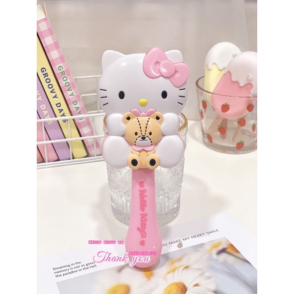 Lược massage túi khí + tay cầm gương trang điểm Hello Kitty