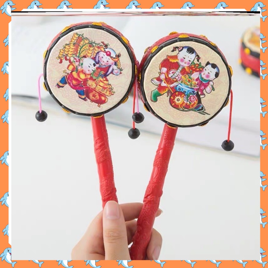 Trống lắc cầm tay cho bé