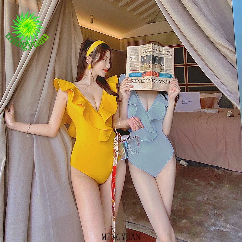 Đồ bơi một mảnh cổ chữ V khoét sâu hở lưng màu vàng thời trang quyến rũ cho nữ
