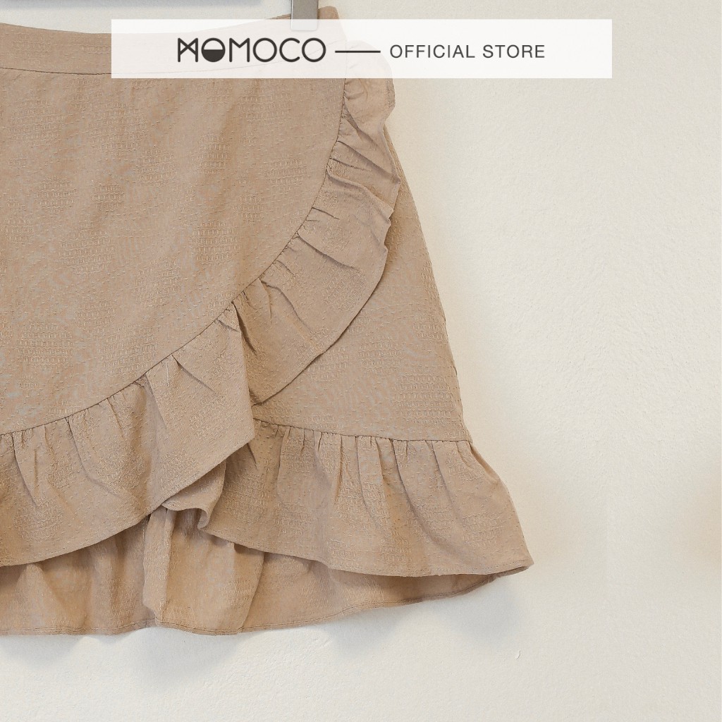 Chân Váy Mini Xòe MOMOCO Vạt Chéo Gấu Bèo Kiểu Dáng Trẻ Trung M2393