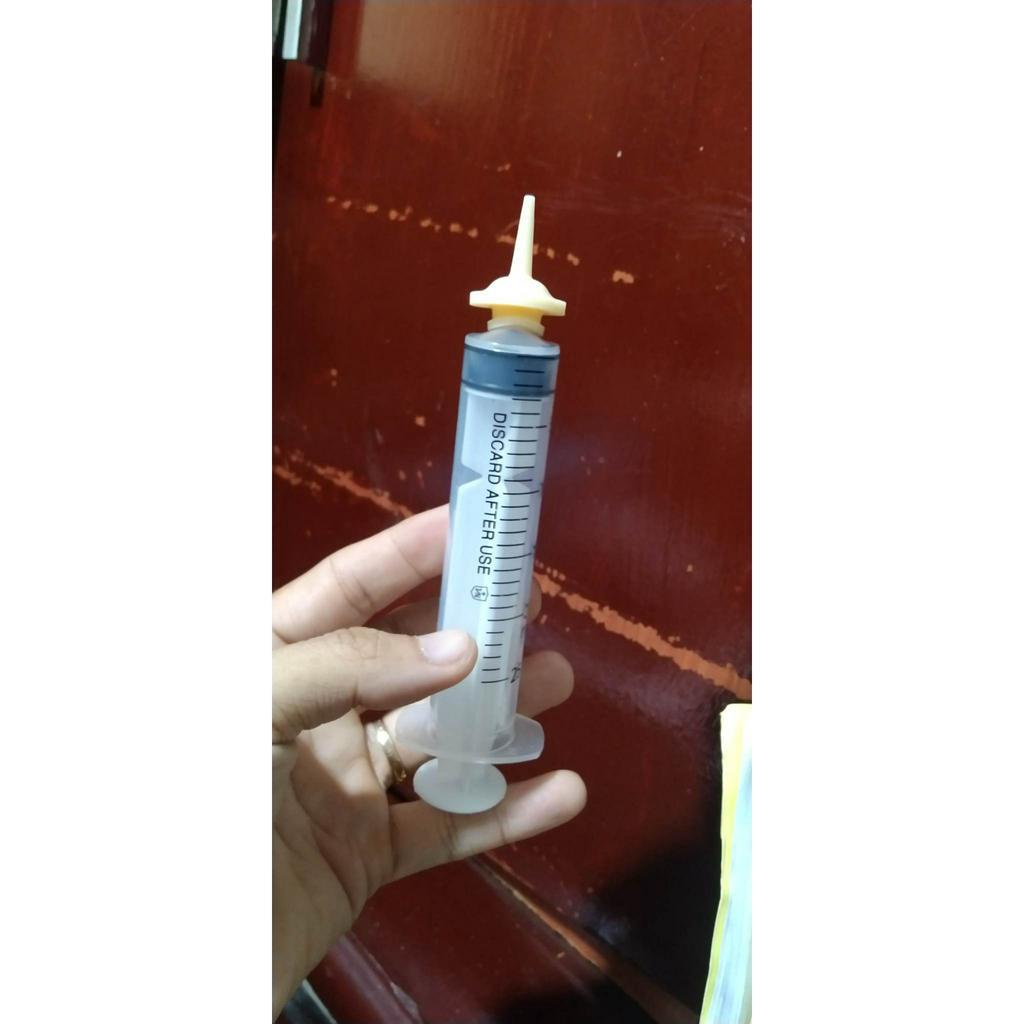 1 núm cao su non đút bột cho vẹt non
