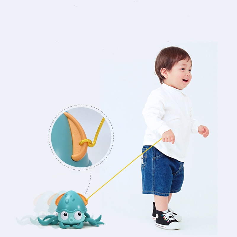 Đồ chơi nhà tắm hình bạch tuộc đi dạo trên cạn và bơi dưới nước ( có dây cót)