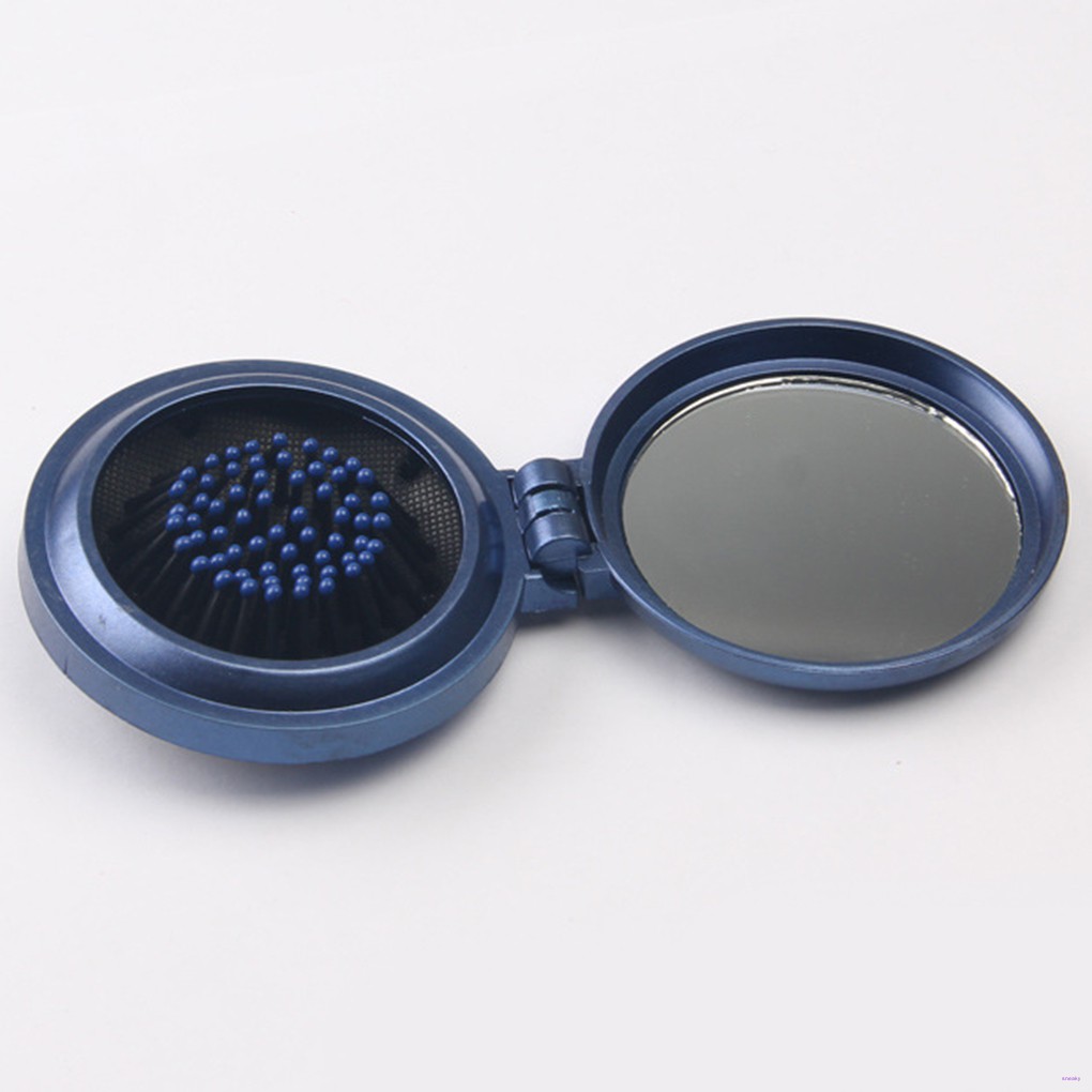 Lược chải tóc gấp gọn được kèm gương tiện lợi để đi du lịch