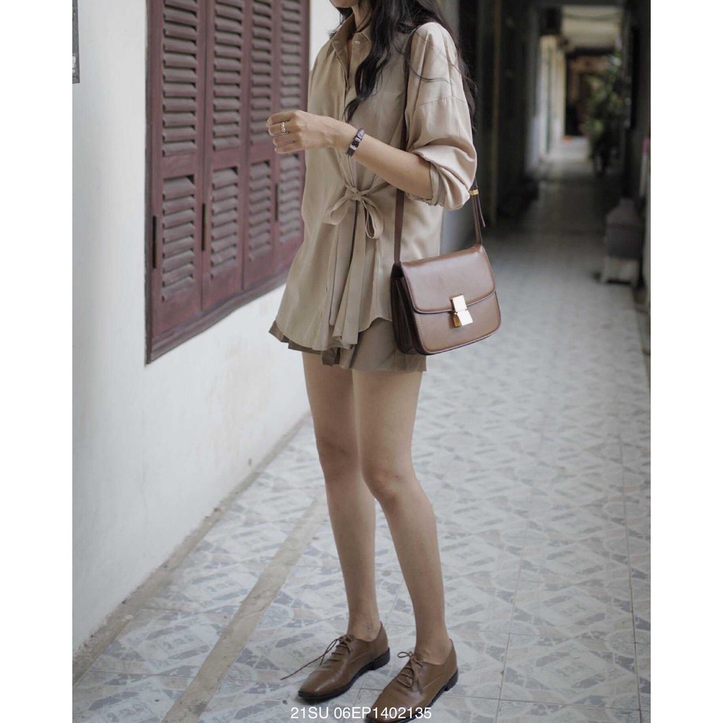 Áo sơ mi tay dài vạt bầu buộc nơ bên ulzzang thời trang Fmstyle Saigon 21SU06EP1402-21SU10HT2801