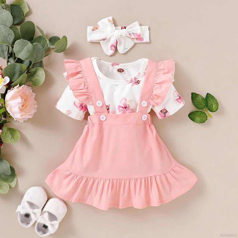 Bộ áo liền quần in họa tiết hoa và đầm dây dành cho bé gái