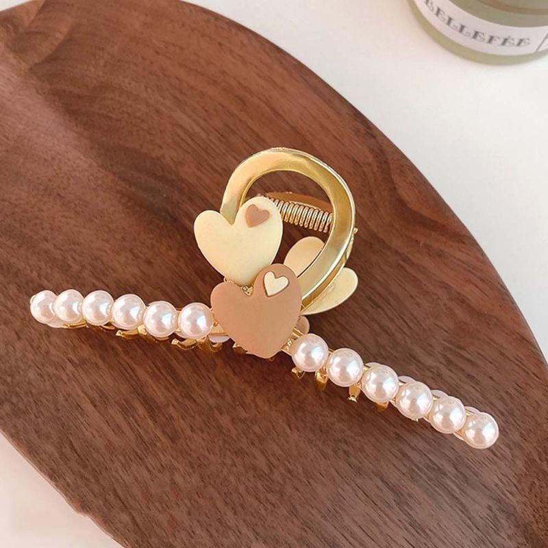 Kẹp tóc dạng T chéo kim loại màu vàng