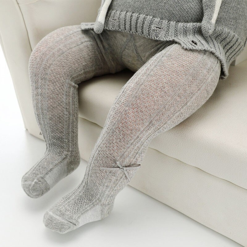 Quần tất cotton mềm mại đính nơ nhỏ thoáng khí màu trơn dễ thương cho trẻ em