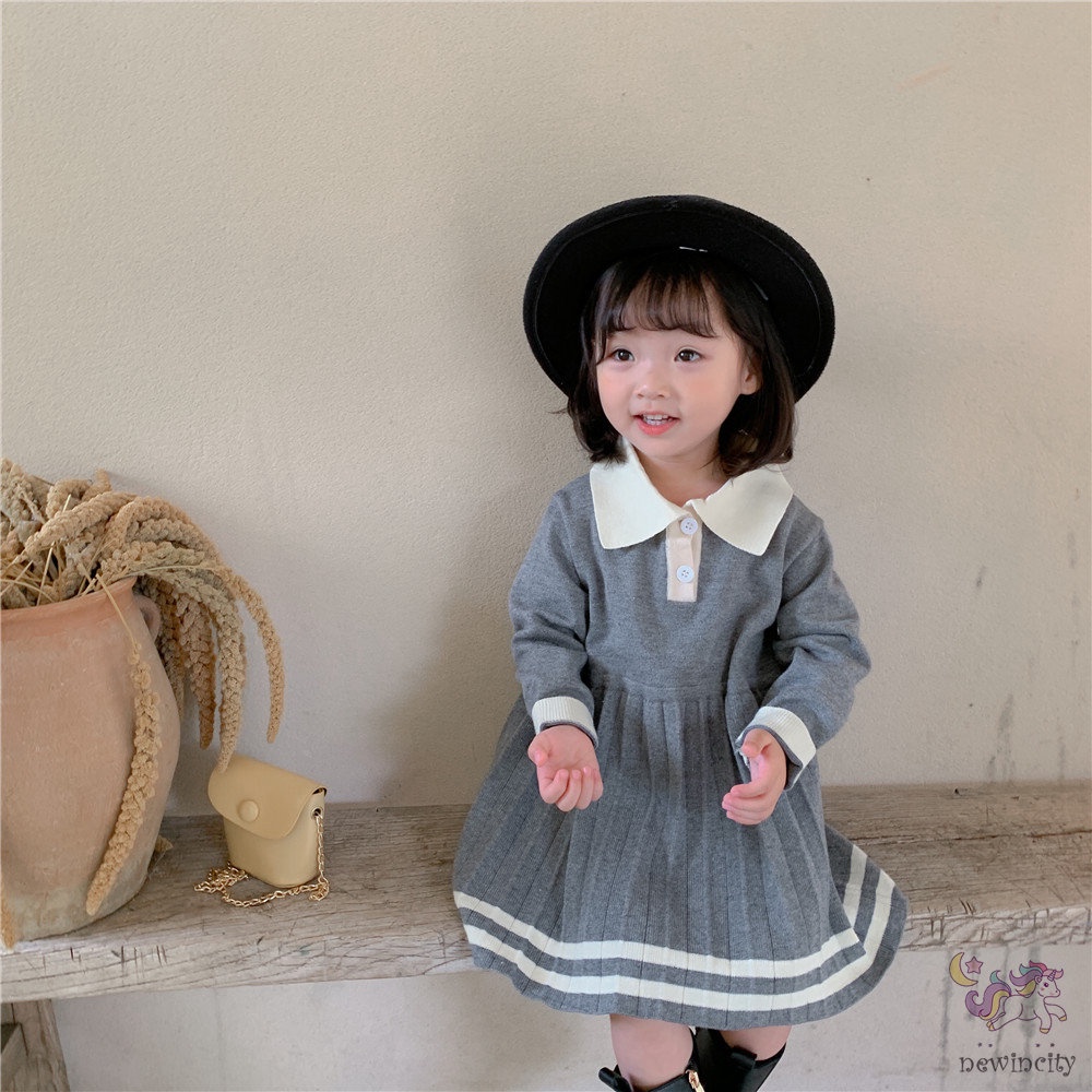 Đầm dài tay phối bèo nhún cho bé