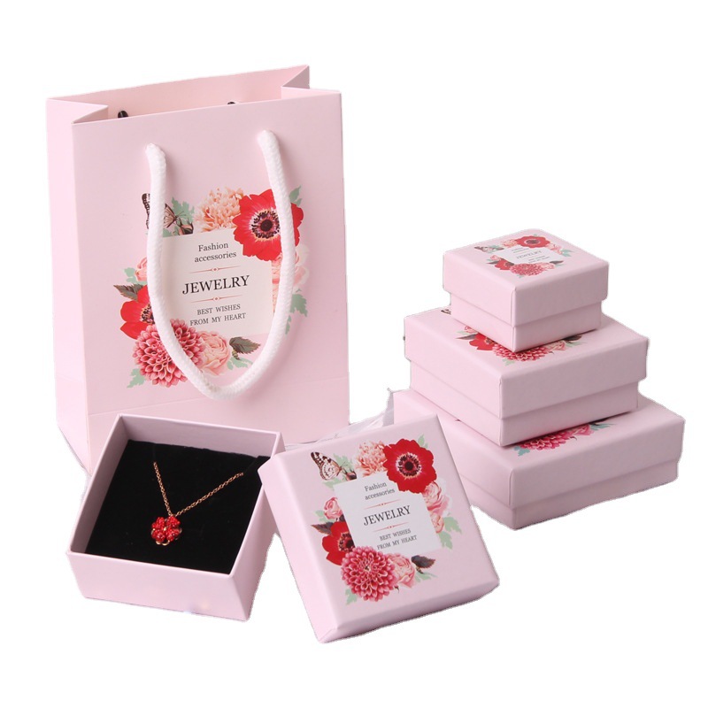 Hộp và túi đựng trang sức/bông tai/dây chuyền màu hồng họa tiết hoa bên trong có bọt xốp mềm