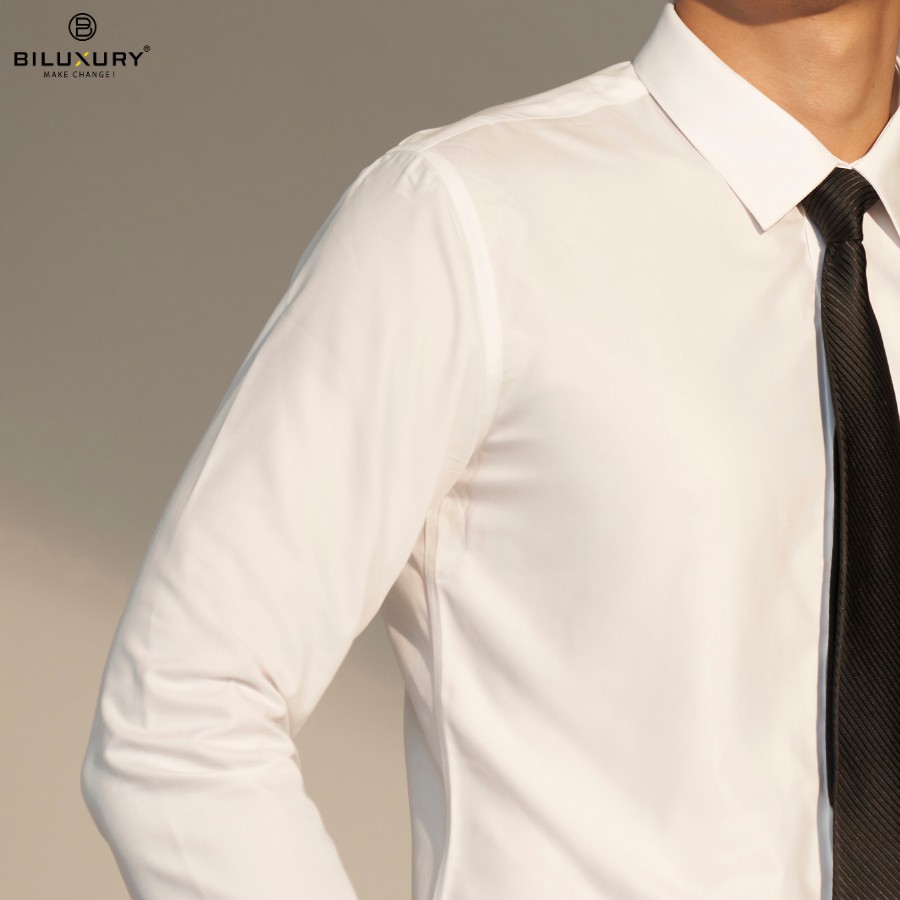Áo sơ mi trắng dài tay Biluxury sợi vải cafe form chuẩn ít nhăn chống bám bụi 5SMDB002TRK | BigBuy360 - bigbuy360.vn