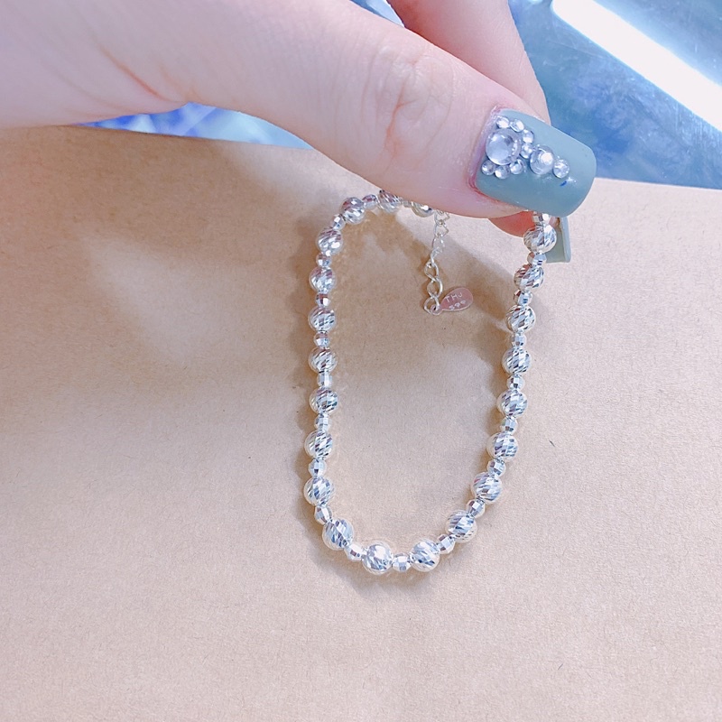 Lắc tay bi bạc ta ảnh thật tự chụp