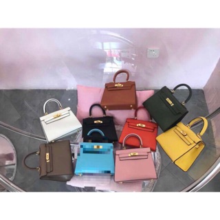 Túi hm dáng cao khoá vàng