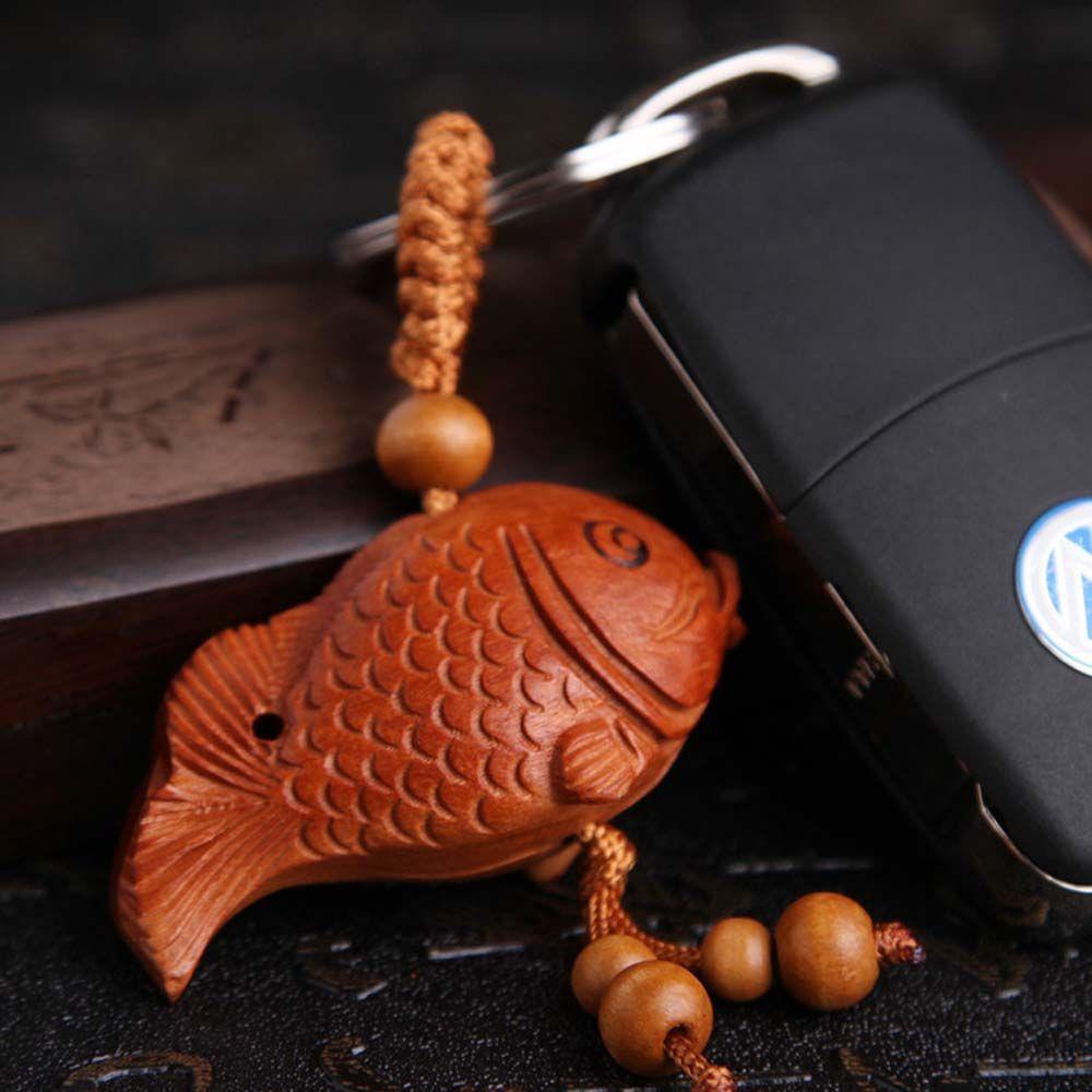 Móc Khóa Hình Cá May Mắn Bằng Gỗ Đào Phong Cách Phật Giáo Tây Tạng