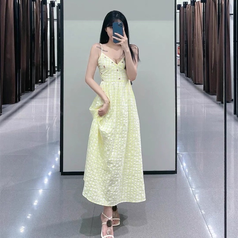 Đầm hai dây hở lưng hàng TQ