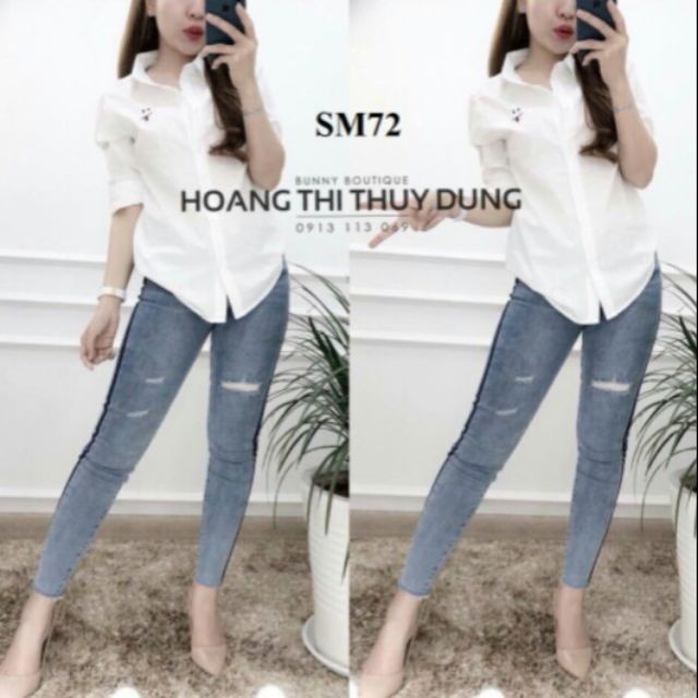 Áo sơ mi trắng in hình mặt cười
