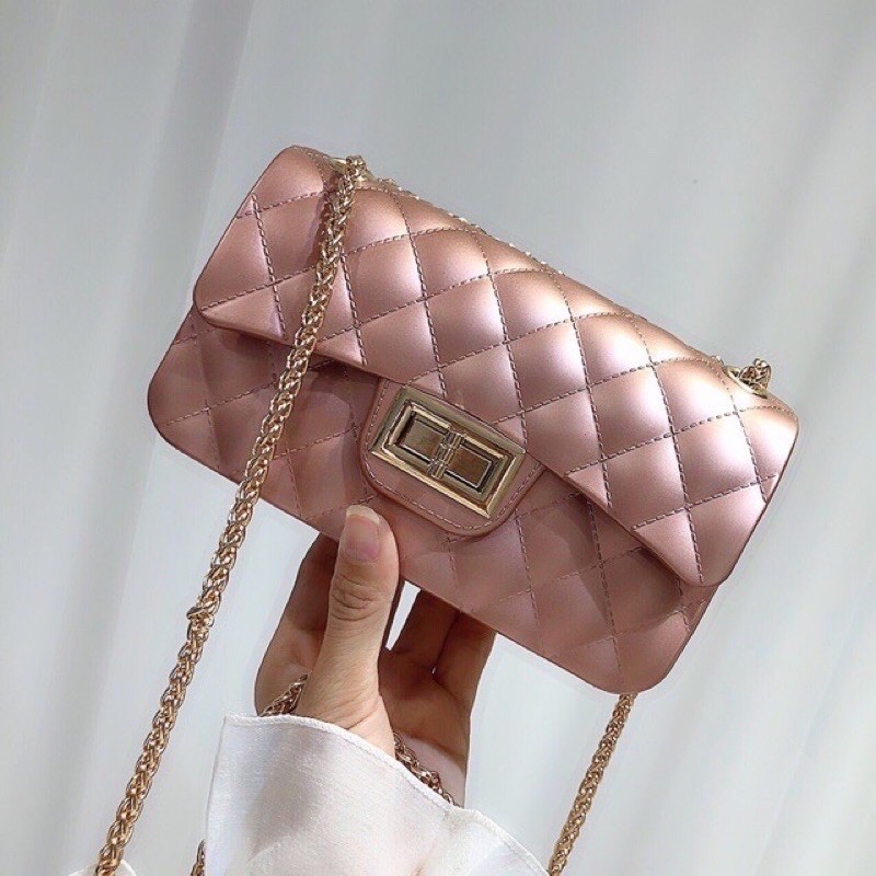 Túi đeo khoá xoay silicon trần trám