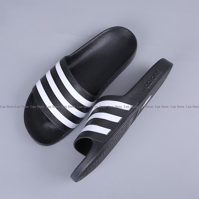 Dép quai ngang dép nam kiểu kẻ ngang đế nhẹ chống trơn trượt cao 3cm.Đức Nội Shop