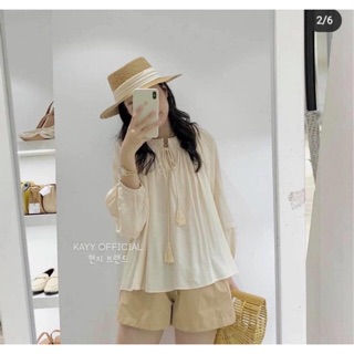 Áo babydoll sơmi tay phồng tua rua