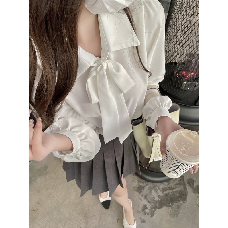 Áo sơ mi tay dài cổ bẻ thắt nơ dáng rộng màu trắng phong cách Hàn Quốc mùa thu thời trang mới dành cho nữ