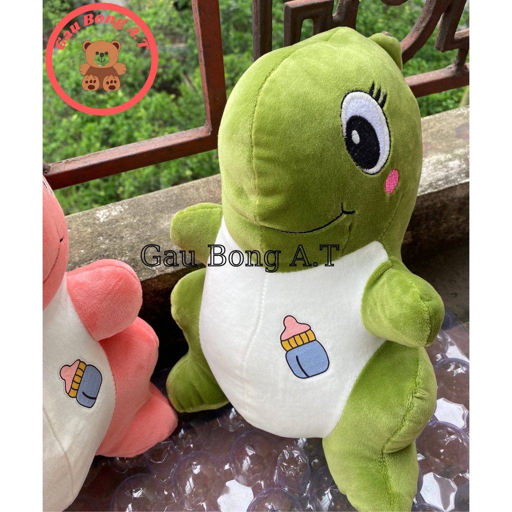 Gấu Bông Khủng Long Ngồi má hồng,ngực in hình siêu cute đáng yêu hai màu xanh - hồng size 30cm