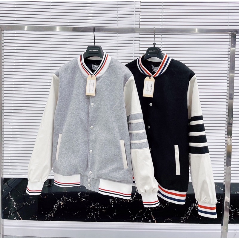 Áo khoác bomber Thom Browne nam nữ vải dạ phối tay da trắng thêu 4 sọc kẻ bo chun vạch màu hàng cao cấp