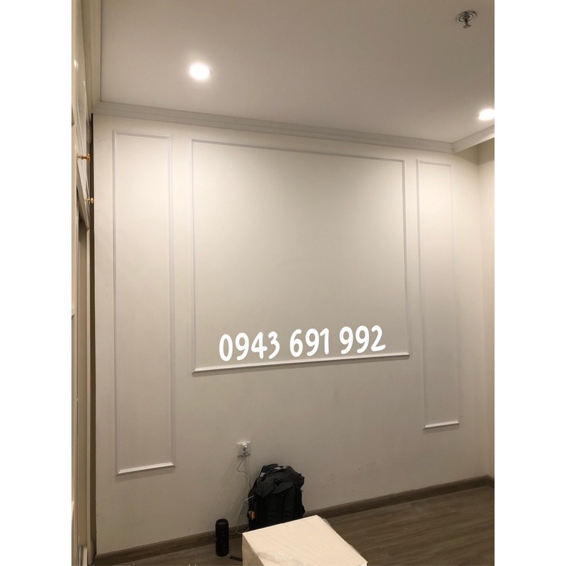 Thi công trang trí diện tường bằng Phào chỉ nhựa HQ màu trắng bản 3cm cân