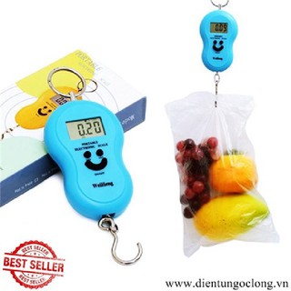 Cân cầm tay mặt cười
