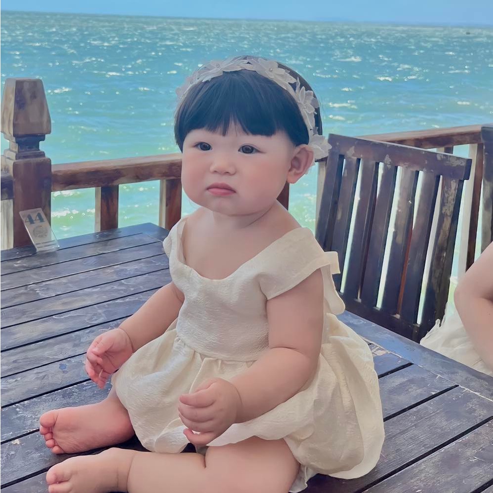 Váy ao đi biển cho bé hở lưng nơ