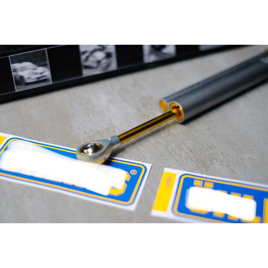 Trợ lực Ohlins ti vàng chính hãng - Home Motorcycle Workshop
